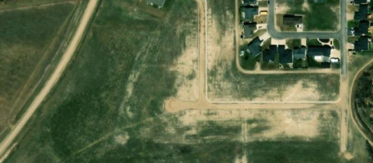 Satellite view of 301 Moore Bay, Carlyle, SK