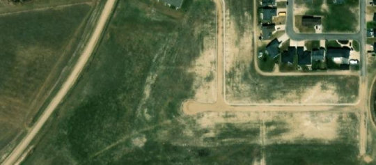 Satellite view of 303 Moore Bay, Carlyle, SK